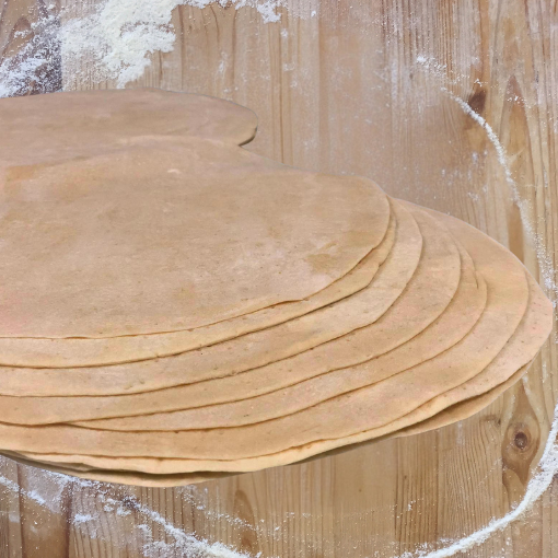 Masa de pizza de grosor fino, ideal para una base crujiente y ligera.
