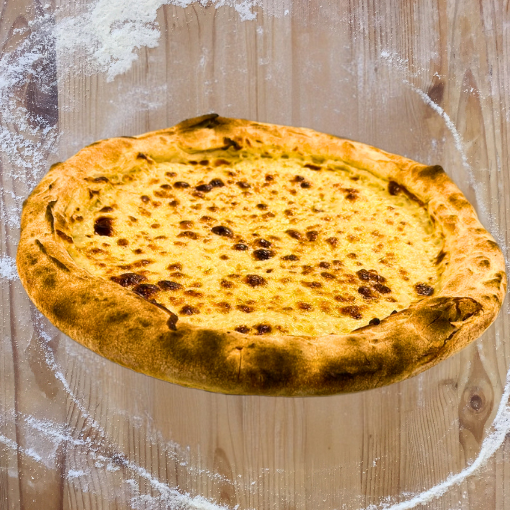 Detalle del grosor de la masa de pizza, clave para una textura perfecta.